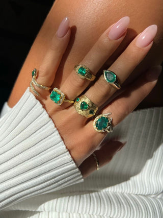 18k Queen Oval Colombian Emerald Ring with Sprinkled Diamonds    by Logan Hollowell Jewelry